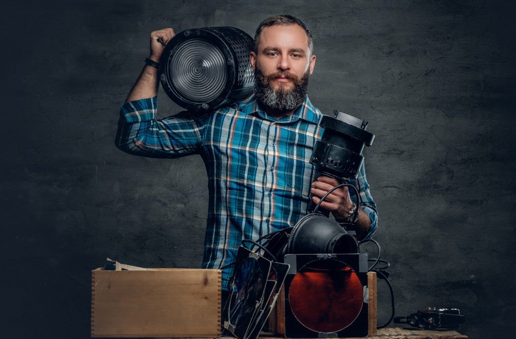 videographer packing equipment