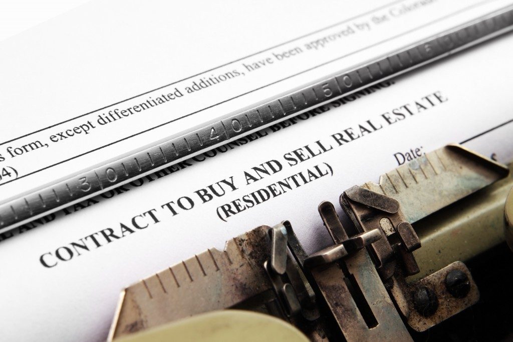 Real estate contract being typed