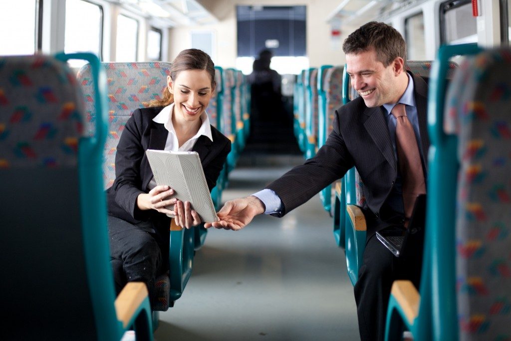 using a tablet while on the bus