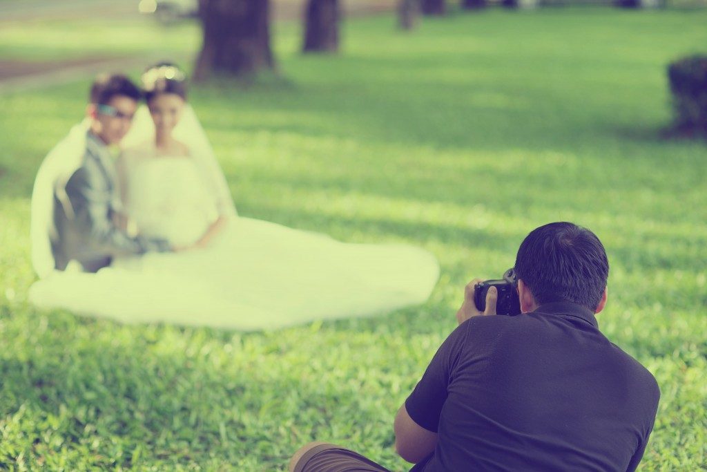 wedding photographer in action vintage style