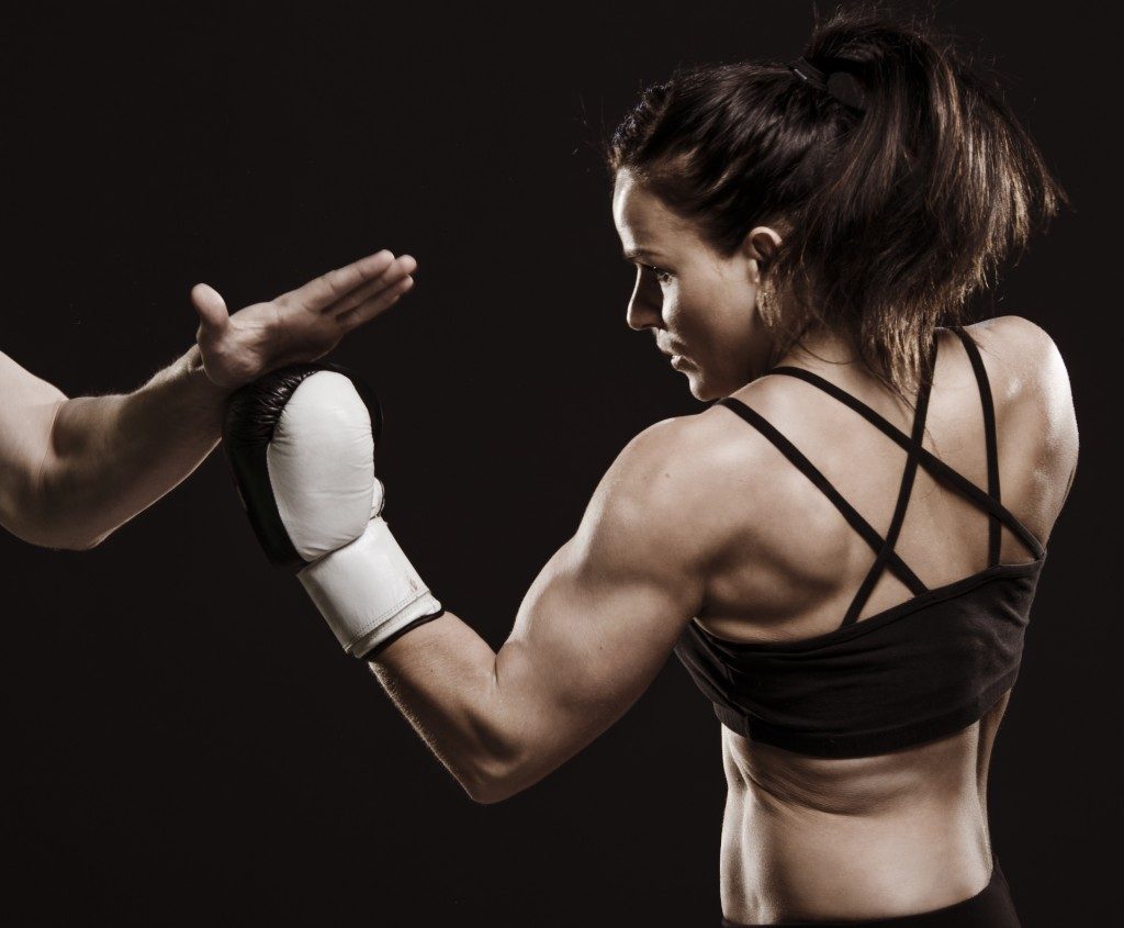 Female boxer in training