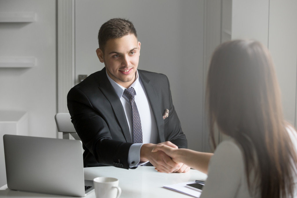 man shaking hands with the interviewer