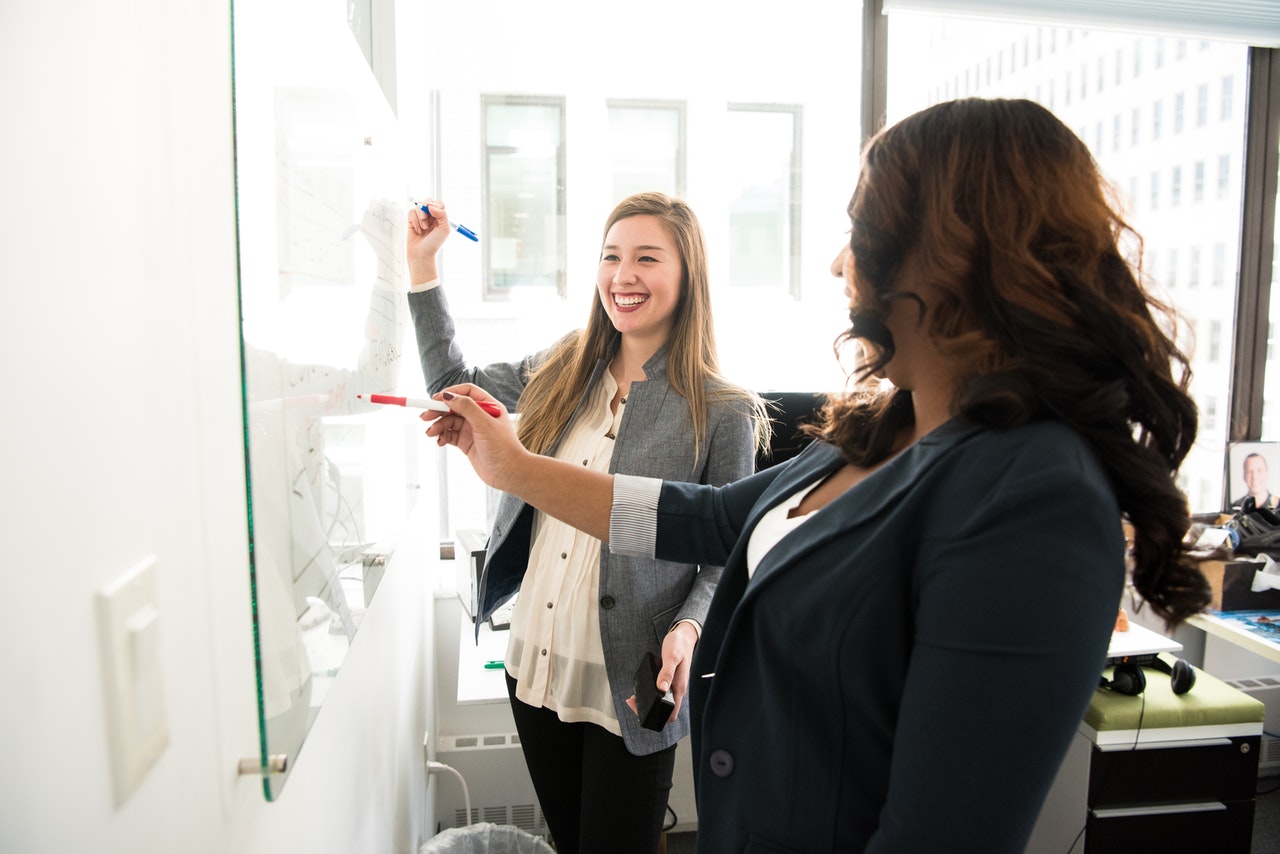 two employees brainstorming