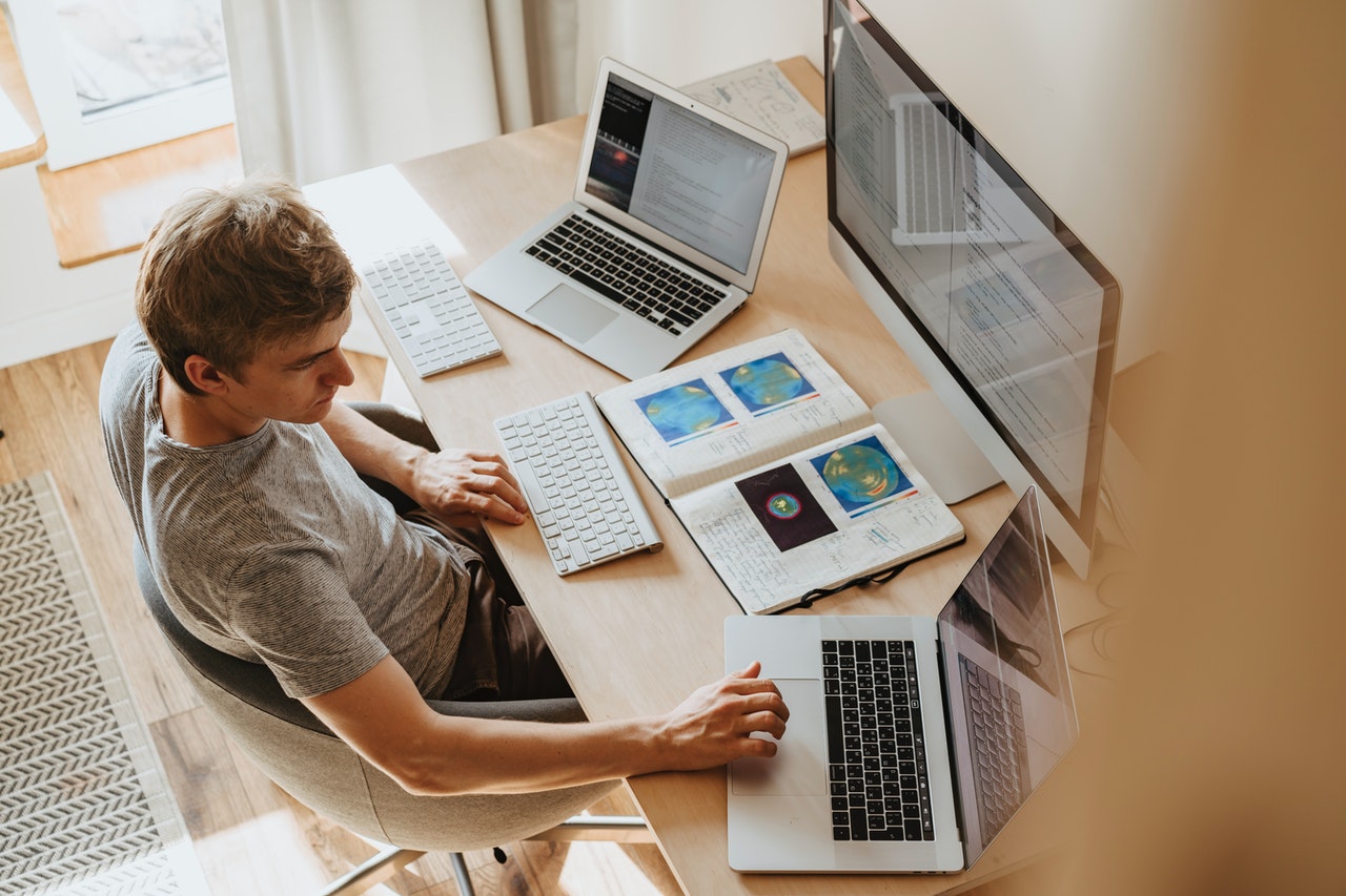 man using his computer