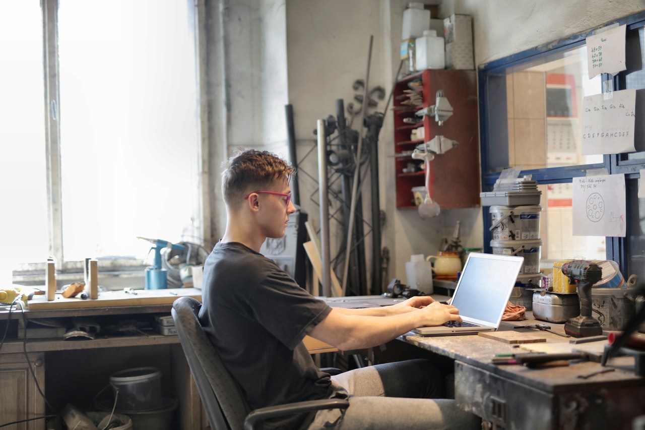 man using his computer