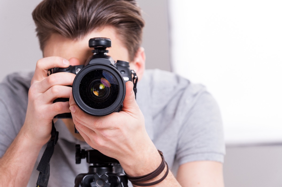 man holding a camera