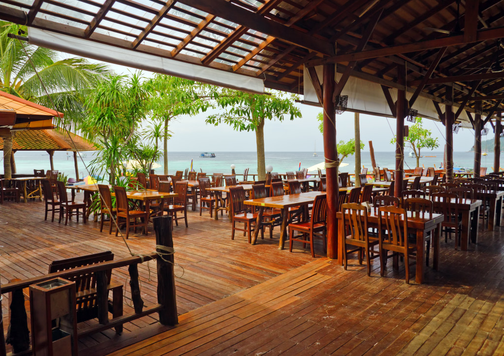 Wooden furniture in beachfront cafe