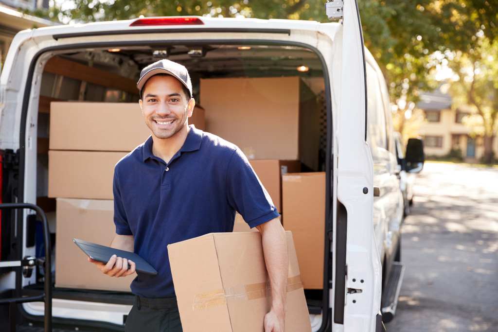 delivery guy with open van full of shipments