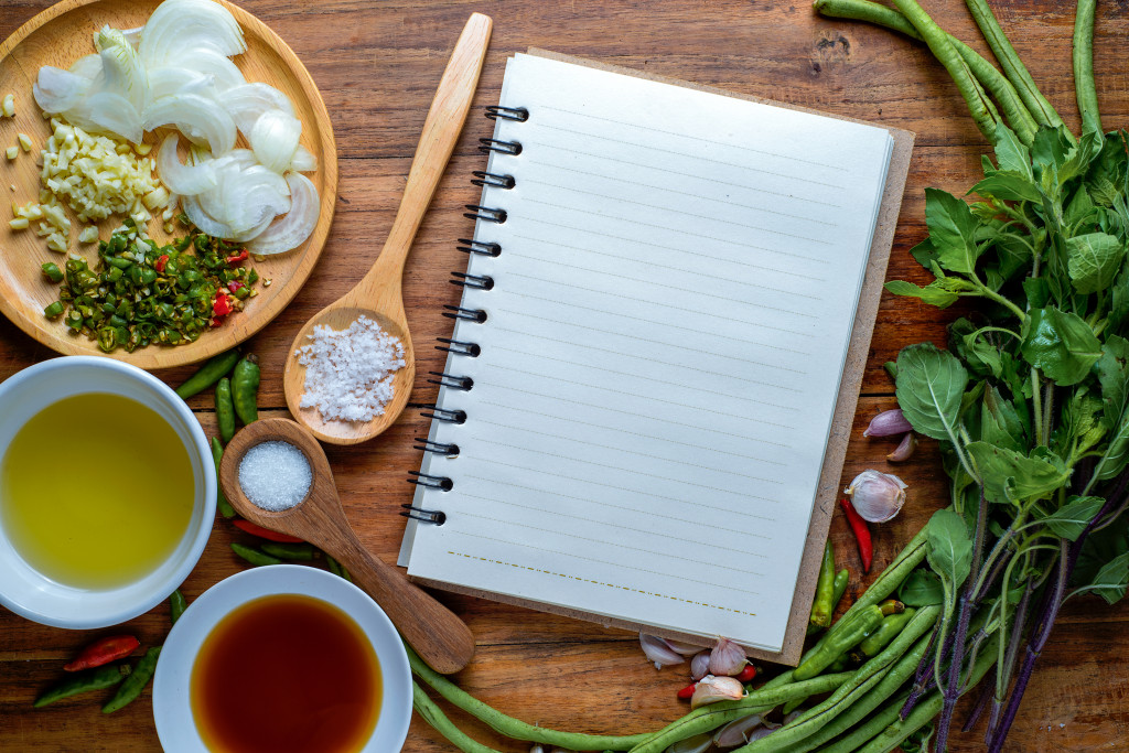 cooking ingredients and a notebook