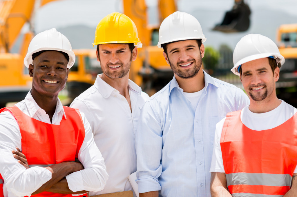 A team of engineers standing in front of site