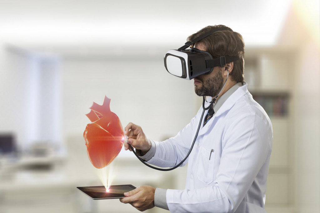 a male doctor is training using virtual reality