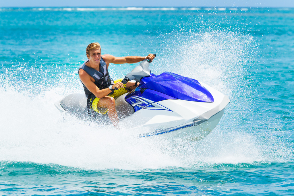 a man riding on a jetski