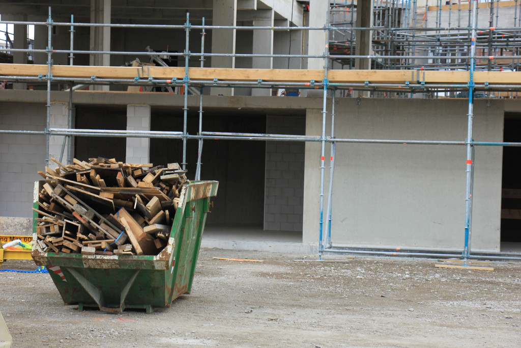 A crane loaded with construction clutters and debris