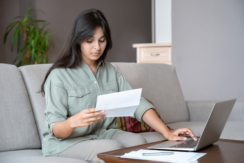 business woman checking her finances online