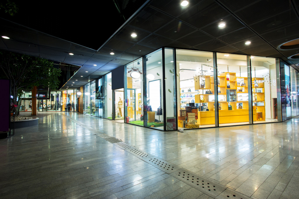 a store inside a shopping center with bright lights