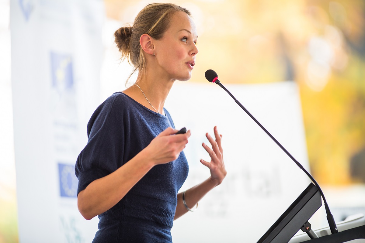 woman giving a presentation in a meeting