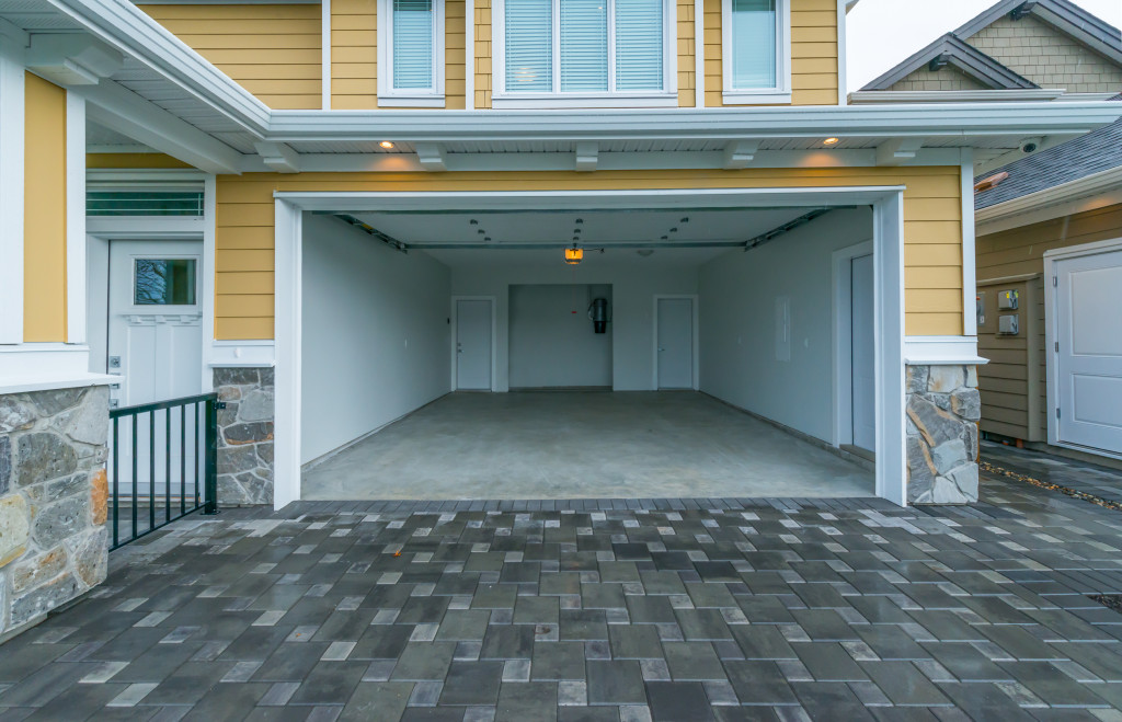 Empty garage of a two-level house.