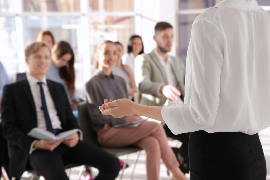 man presenting in seminar or training