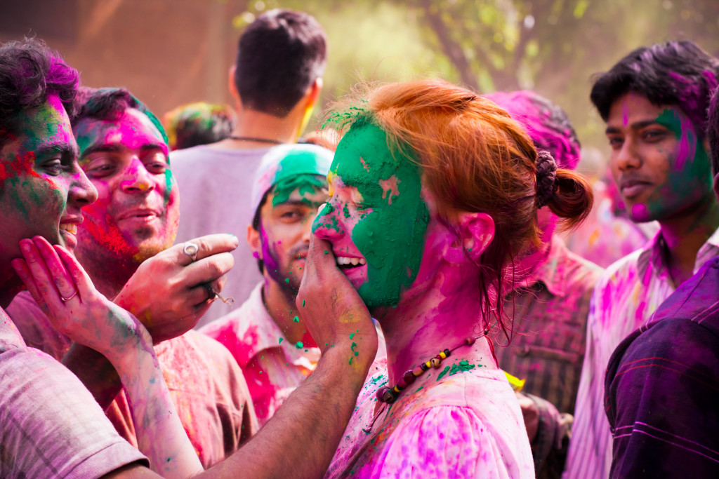 a group of people with paint all over their body